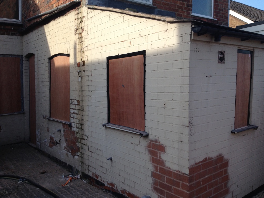 Rear Kitchen covered in white paint