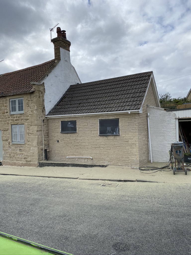 Stone house after blast cleaning